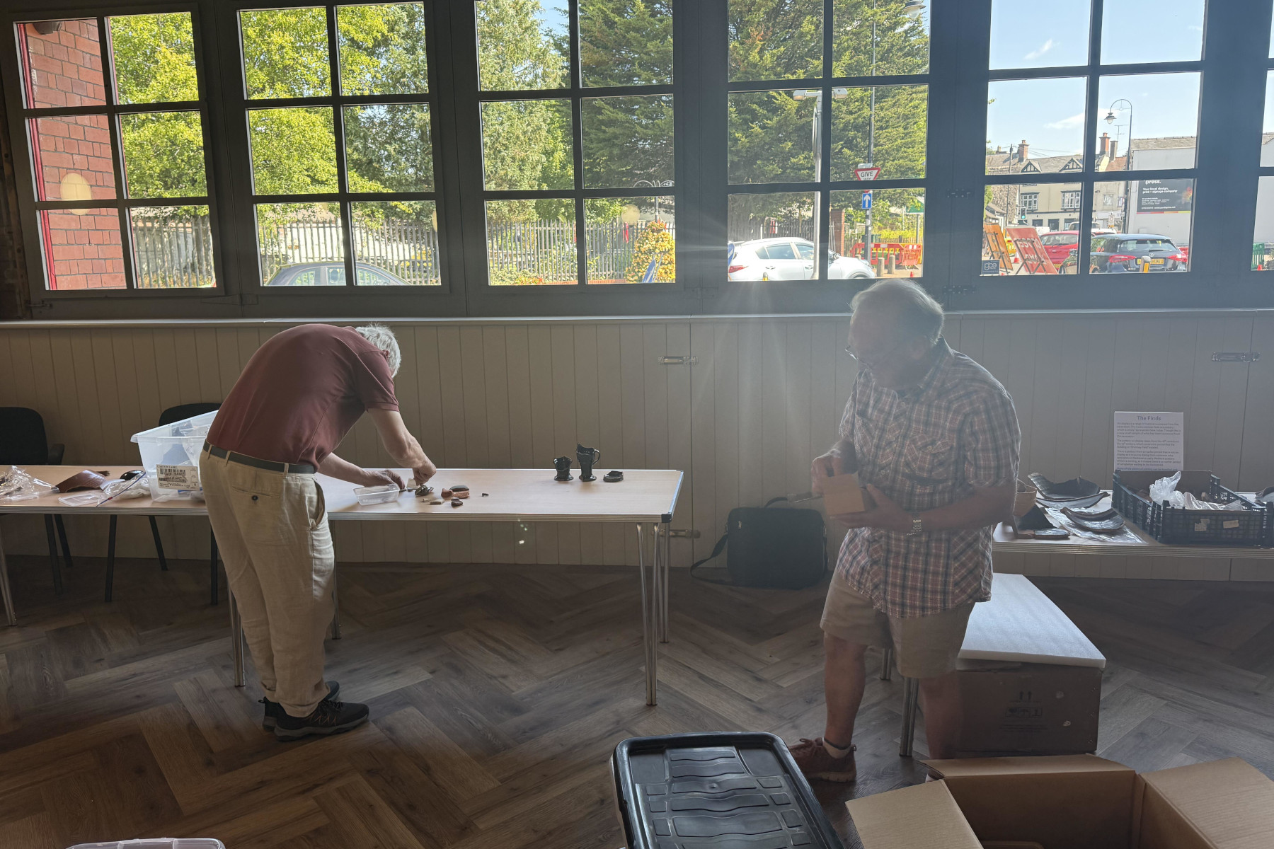 Winston and Alan arranging some of the most recent finds for display